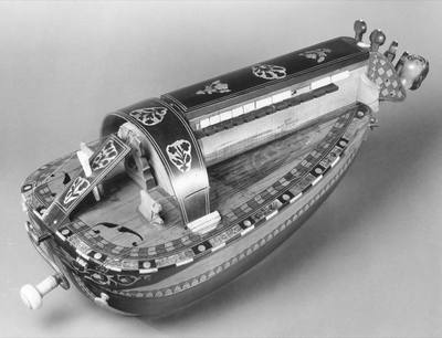Hurdy-Gurdy (ca. 1879) — Hurdy-gurdy, photograph from The Met