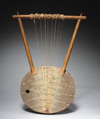 Lyre (ndongo, endongo, entongoli, or kissar) (by 1928) — Lyre, photograph from Cleveland Museum of Art